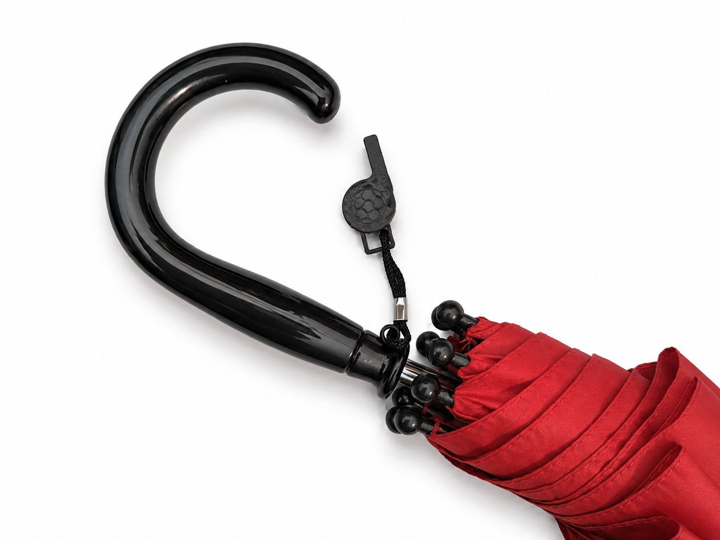 Red umbrella with a black handle on a white background