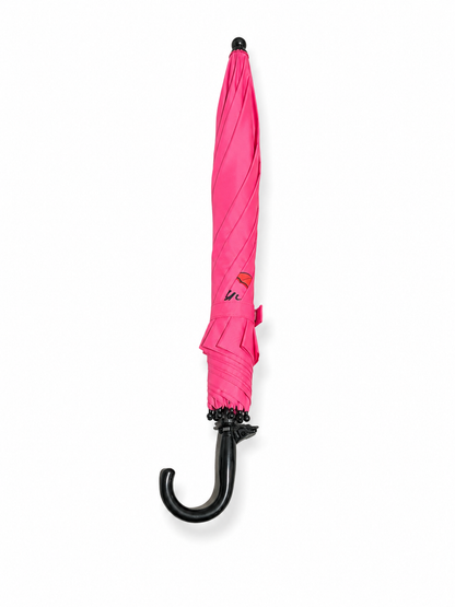 Pink umbrella with black handle and tip on a white background